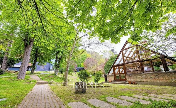 Unique villa surrounded by a private garden with ancient trees